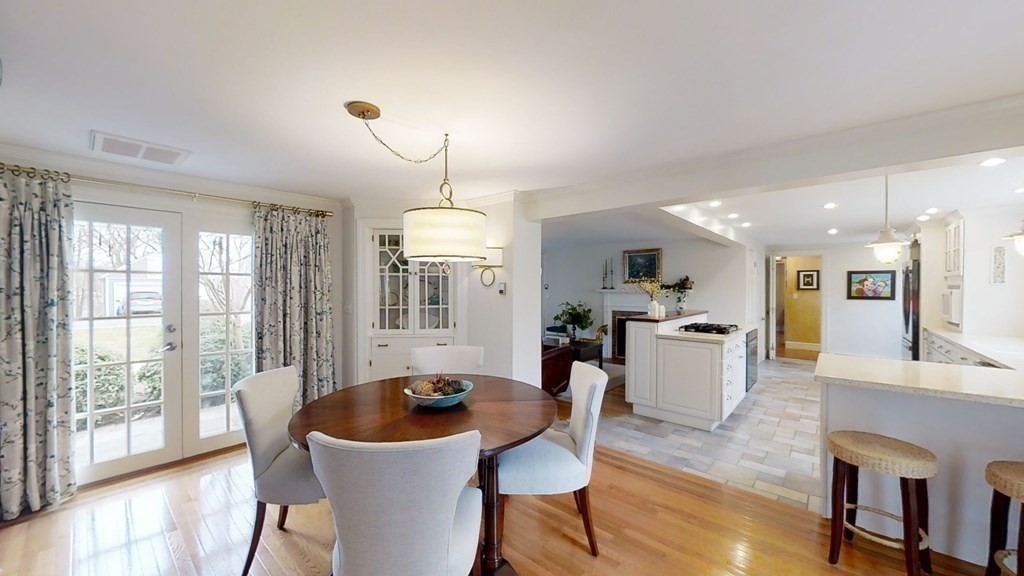 192 Berwick Road Attleboro, MA 02703 - Photo 11 of 42 a view of a dining room with furniture window and wooden floor