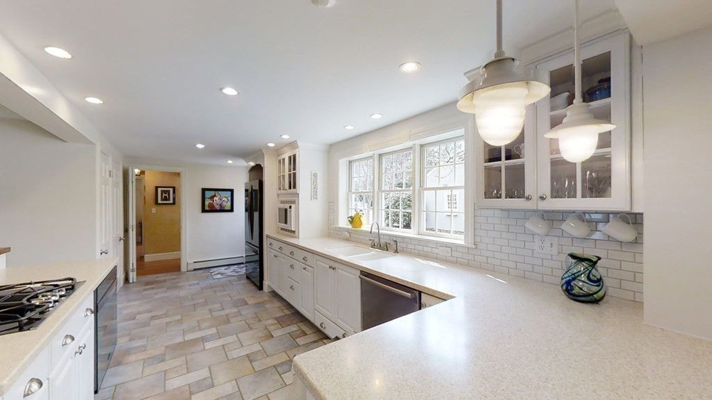 192 Berwick Road Attleboro, MA 02703 - Photo 14 of 42 a kitchen with refrigerator and cabinets