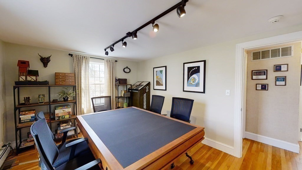 192 Berwick Road Attleboro, MA 02703 - Photo 25 of 42 a view of a dining room with furniture and wooden floor