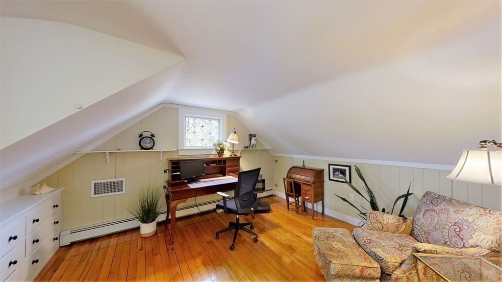 192 Berwick Road Attleboro, MA 02703 - Photo 30 of 42 a view of a livingroom with furniture and wooden floor