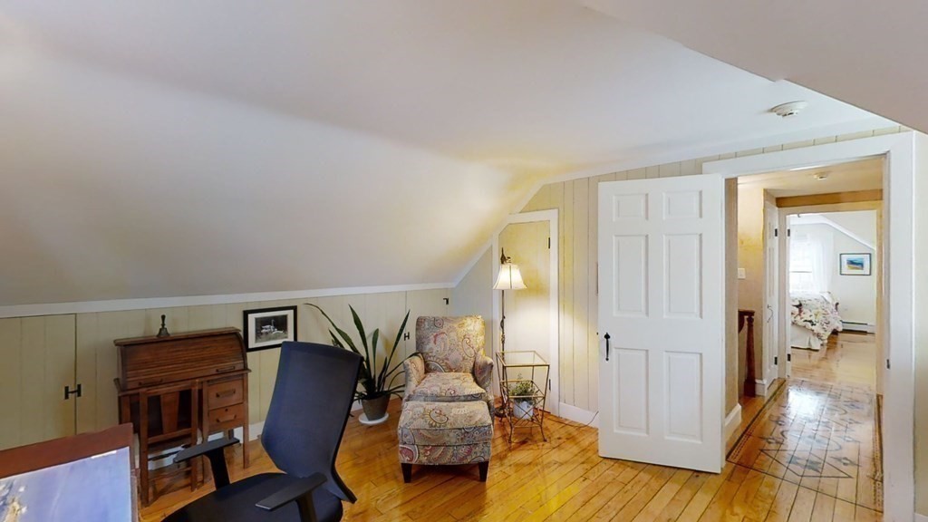 192 Berwick Road Attleboro, MA 02703 - Photo 31 of 42 a view of a livingroom with furniture and wooden floor