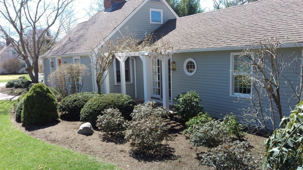 192 Berwick Road Attleboro, MA 02703 - Photo 35 of 42 a front view of a house with garden