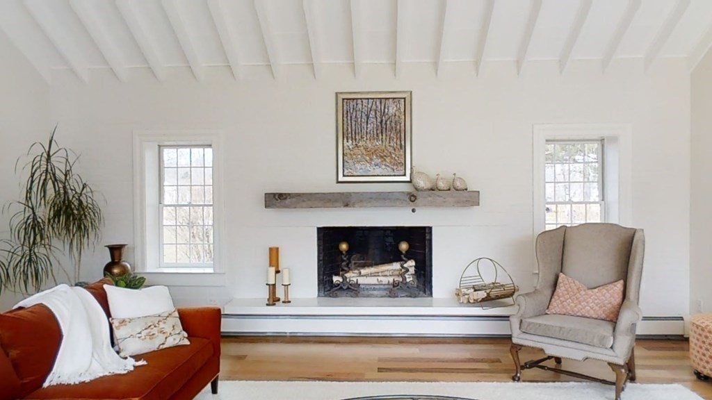 192 Berwick Road Attleboro, MA 02703 - Photo 7 of 42 a living room with furniture and a fireplace