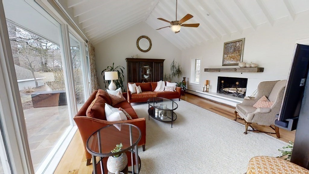 192 Berwick Road Attleboro, MA 02703 - Photo 8 of 42 a living room with furniture and a fireplace