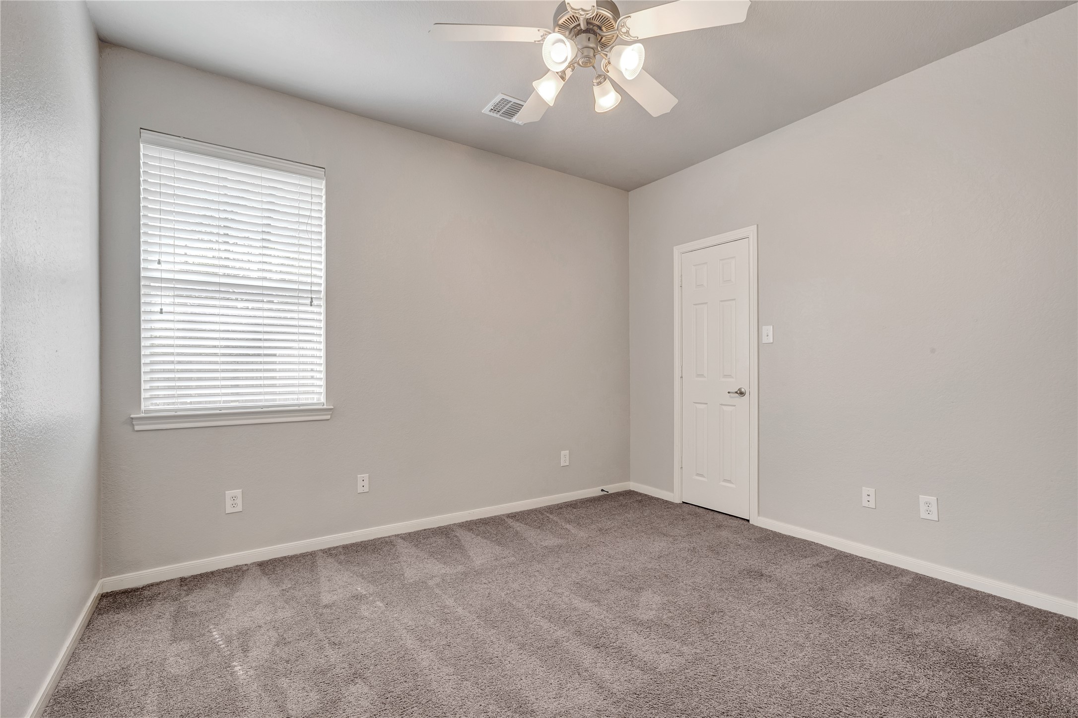 27 Planchard Court Spring, TX 77382 - Photo 11 of 16 an empty room with a window