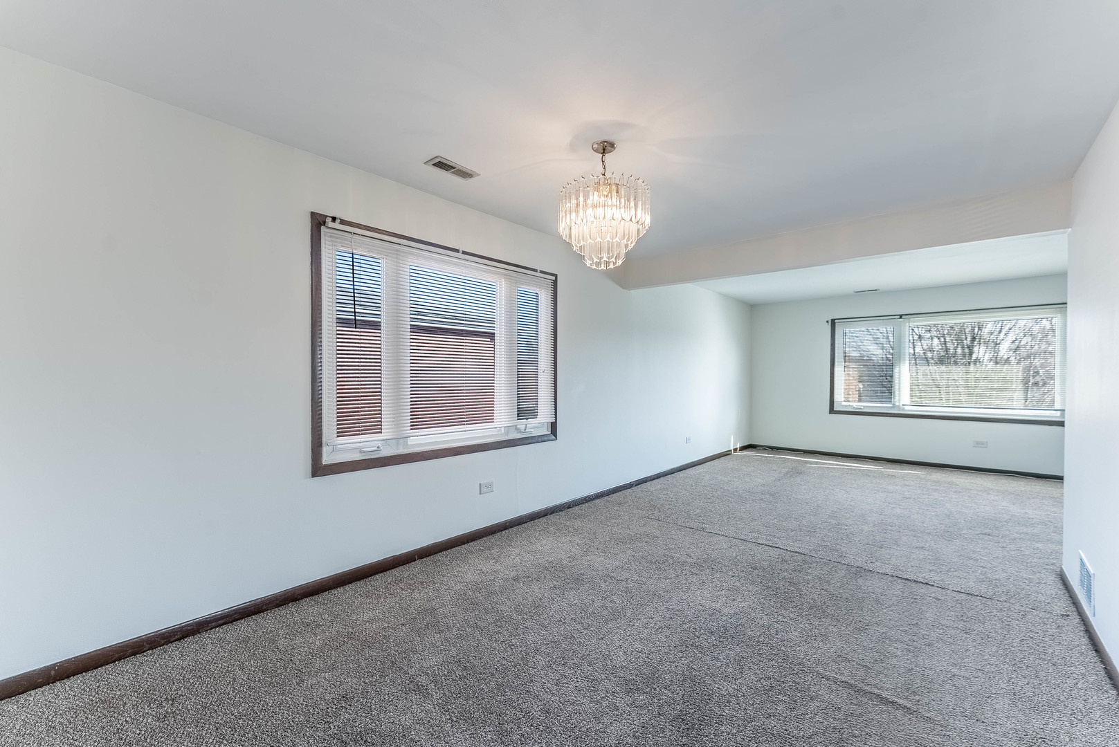 7560 Banks Street, Unit 2 Justice, IL 60458 - Photo 4 of 14 a view of an empty room with a window
