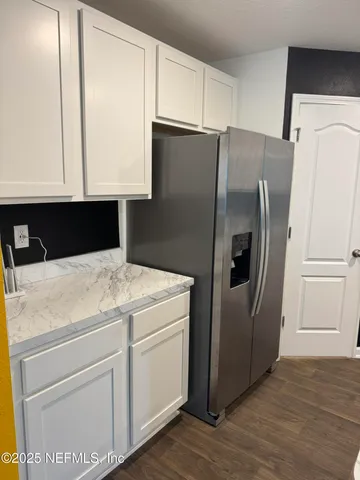 a view of a house with a big yard