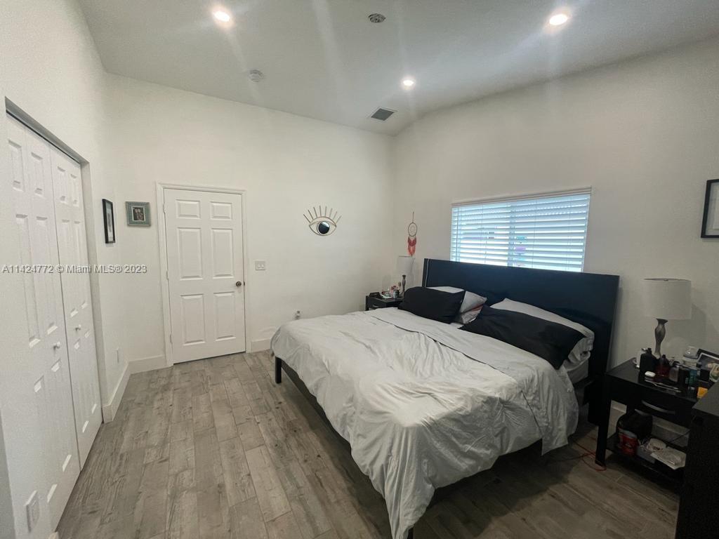 Silver Falls Miramar, FL 33027 - Photo 12 of 24 a bedroom with a bed and a closet