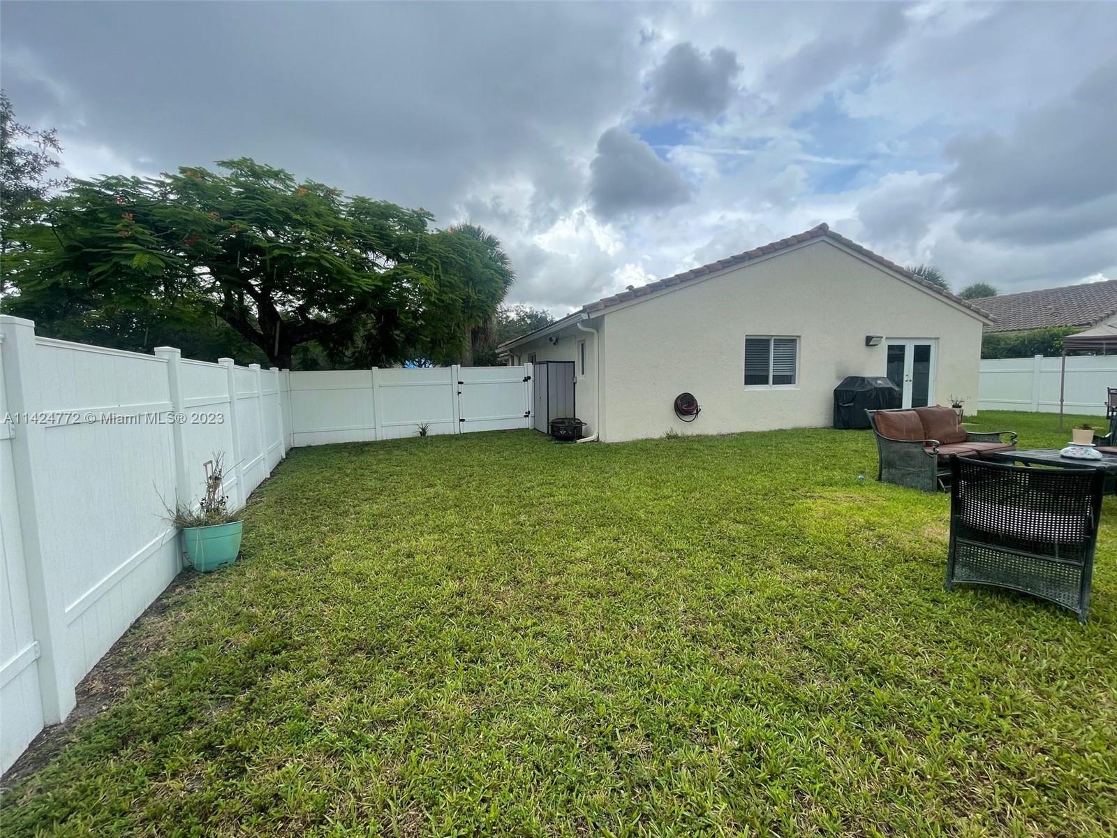Silver Falls Miramar, FL 33027 - Photo 20 of 24 a house view with a garden space