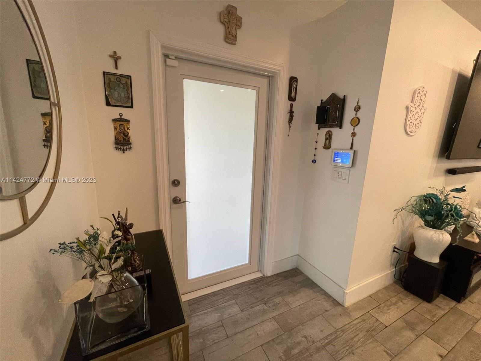 Silver Falls Miramar, FL 33027 - Photo 3 of 24 a living room with furniture and a mirror