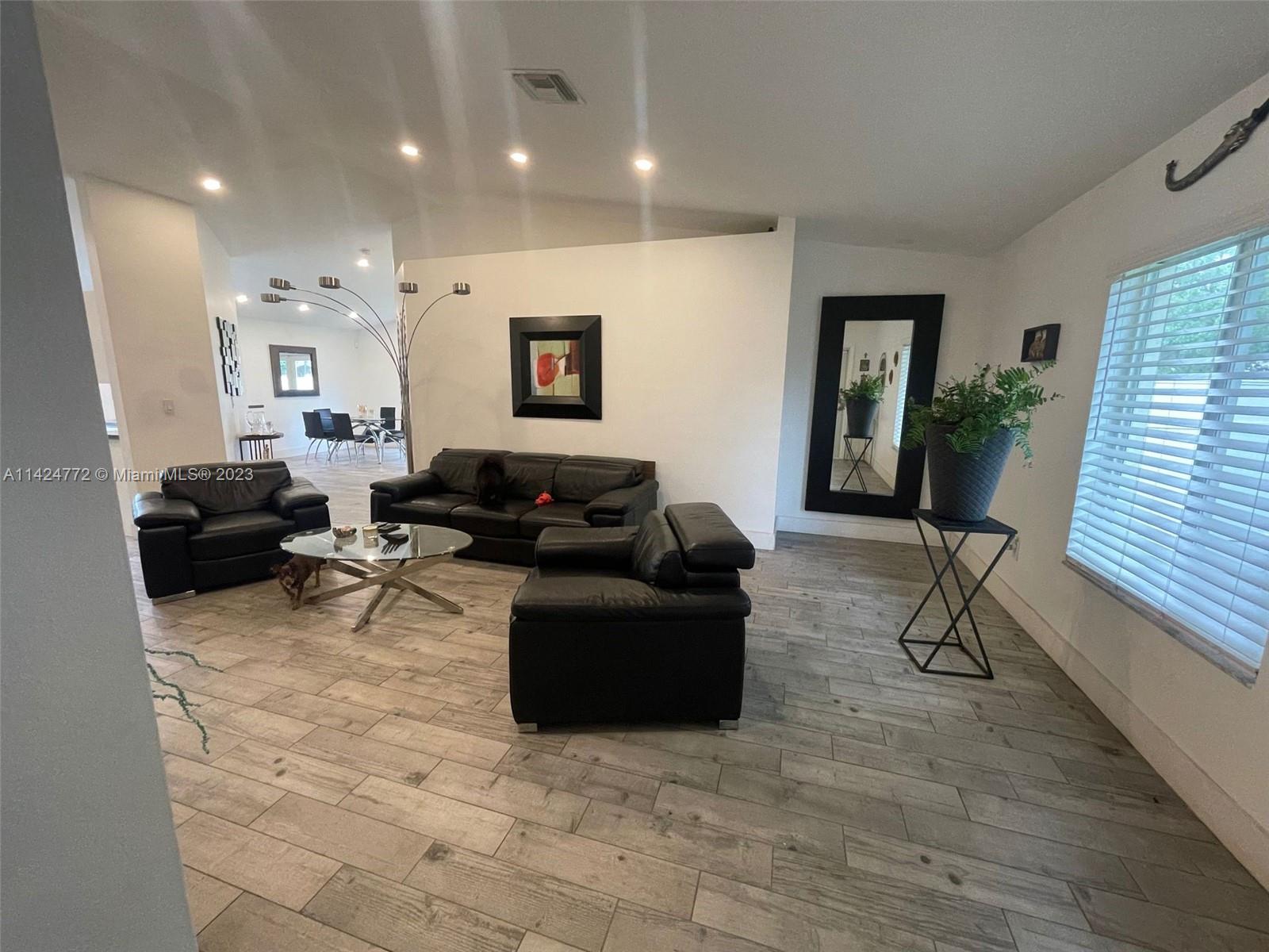 Silver Falls Miramar, FL 33027 - Photo 6 of 24 a living room with furniture and a window