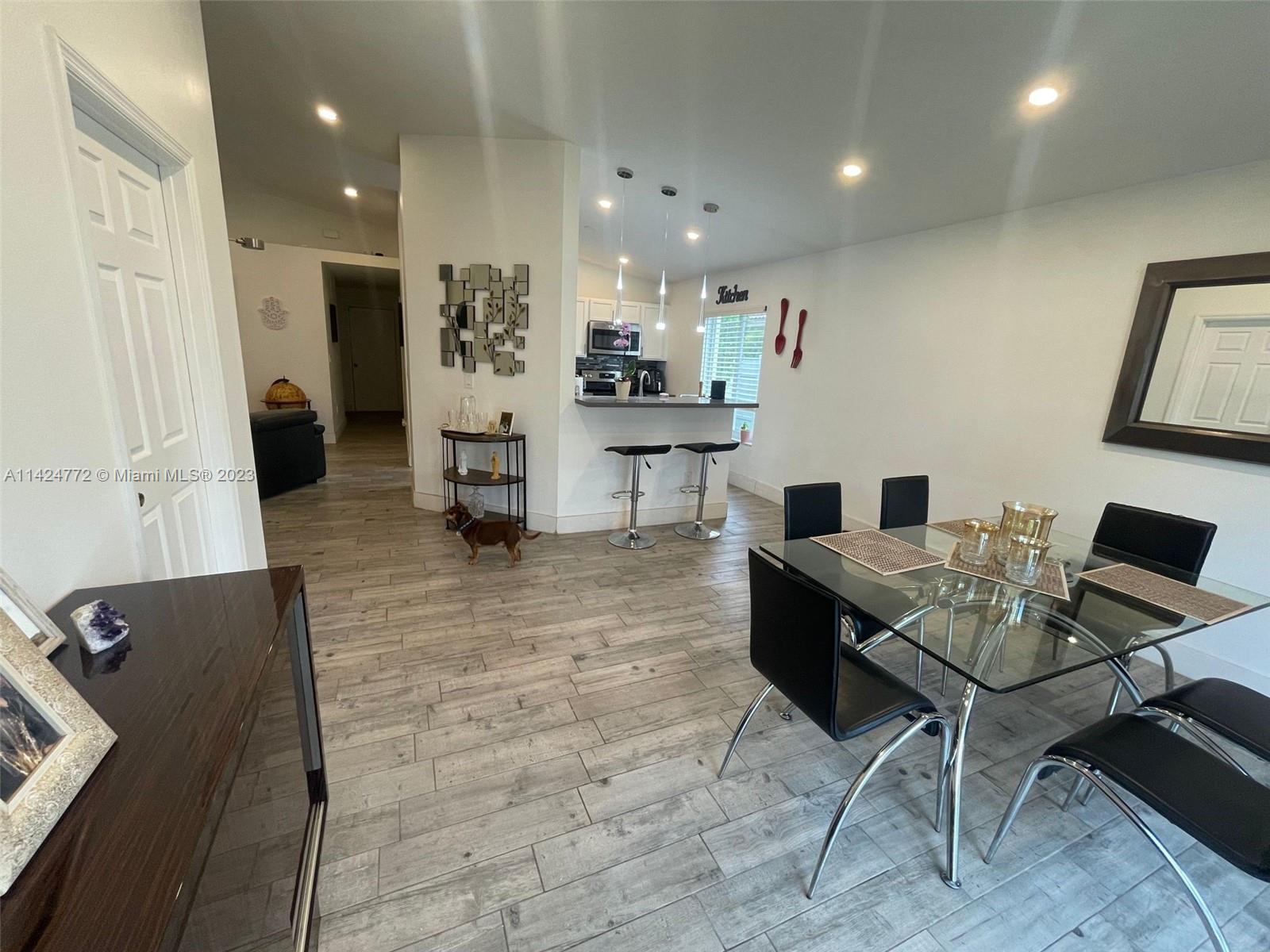 Silver Falls Miramar, FL 33027 - Photo 7 of 24 a living room with furniture and a table