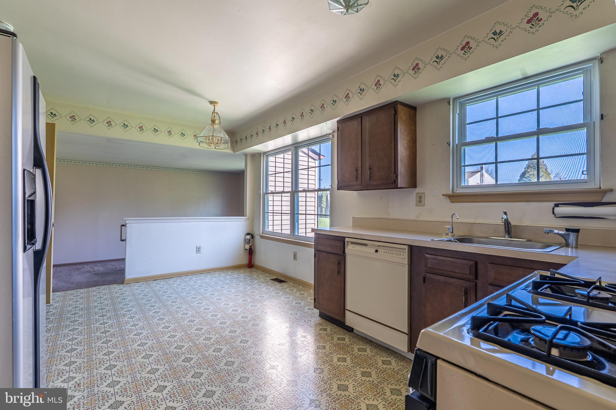 894 Herman Road Horsham, PA 19044 - Photo 14 of 32 a kitchen with a stove a sink and a microwave