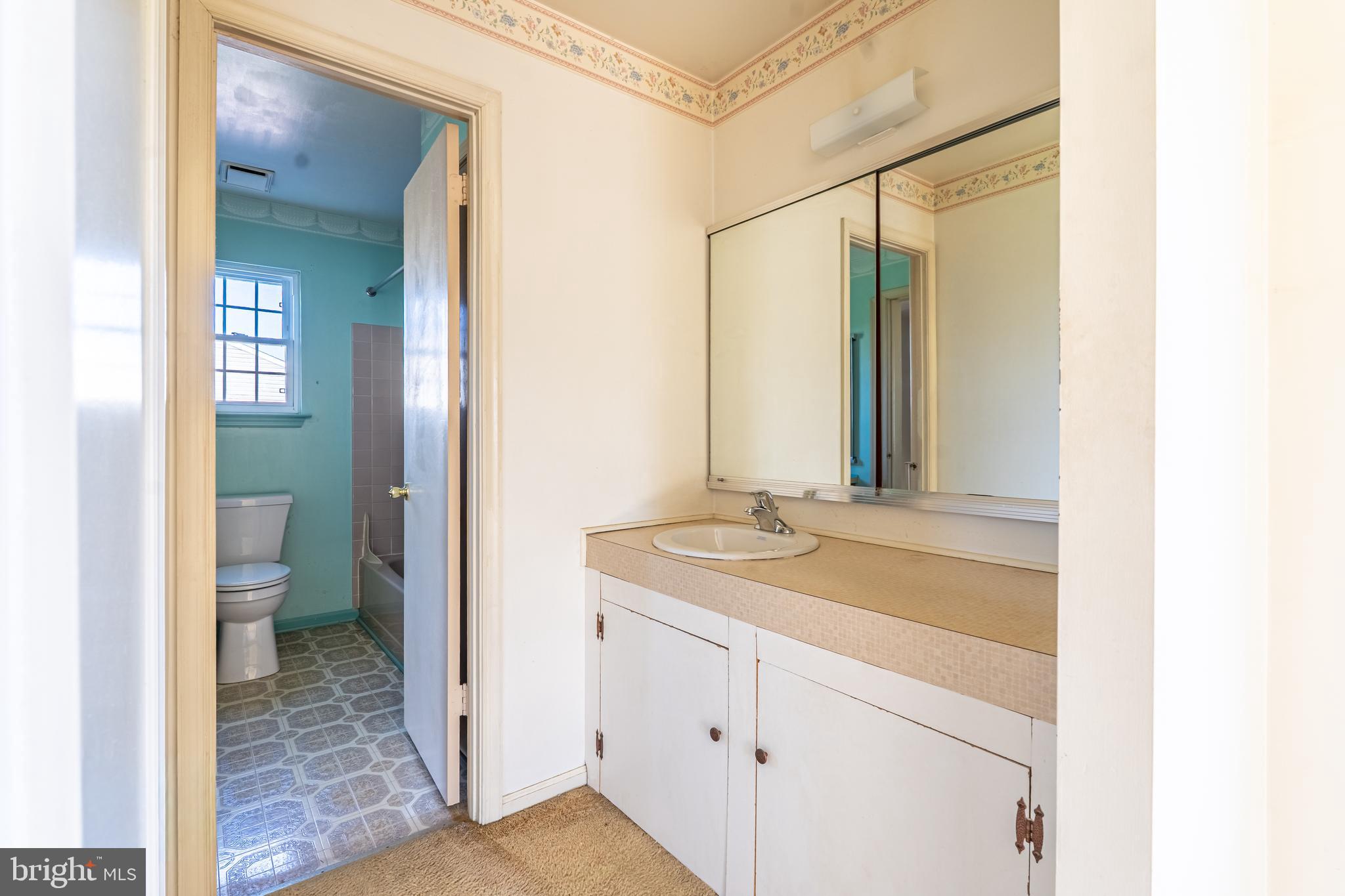 894 Herman Road Horsham, PA 19044 - Photo 17 of 32 a en suite bathroom with a granite countertop sink and a mirror