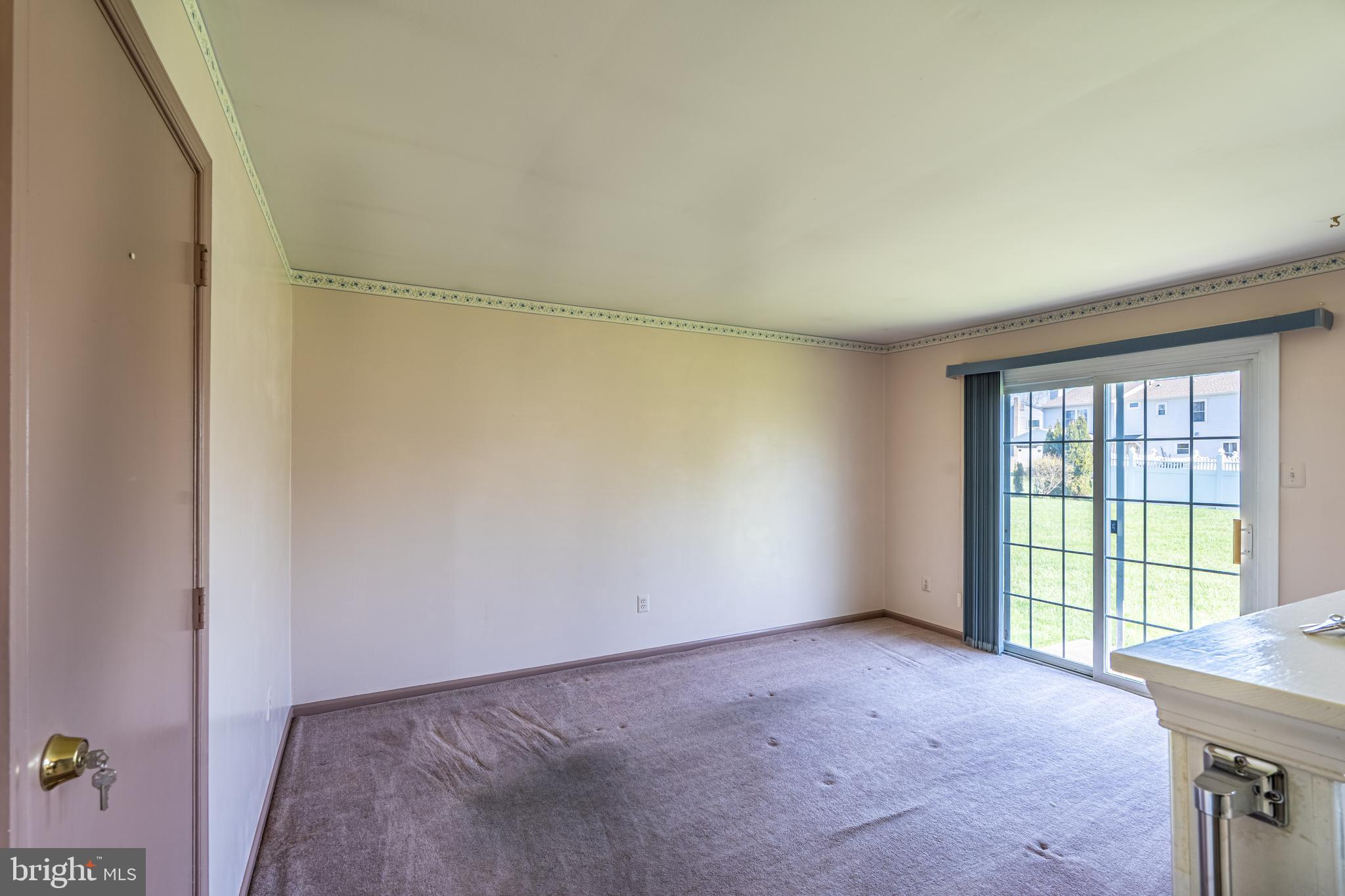 894 Herman Road Horsham, PA 19044 - Photo 18 of 32 a view of an empty room with a window