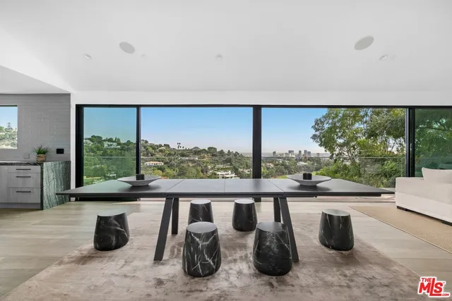 a room with wooden floor and furniture