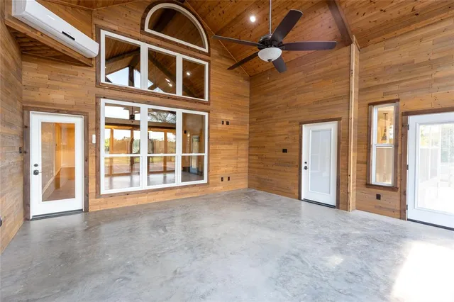 a view of a livingroom with storage and utility