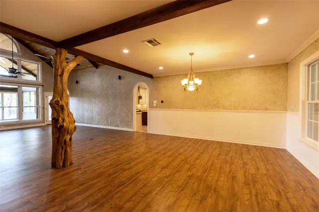 a kitchen with a stove a sink and a refrigerator