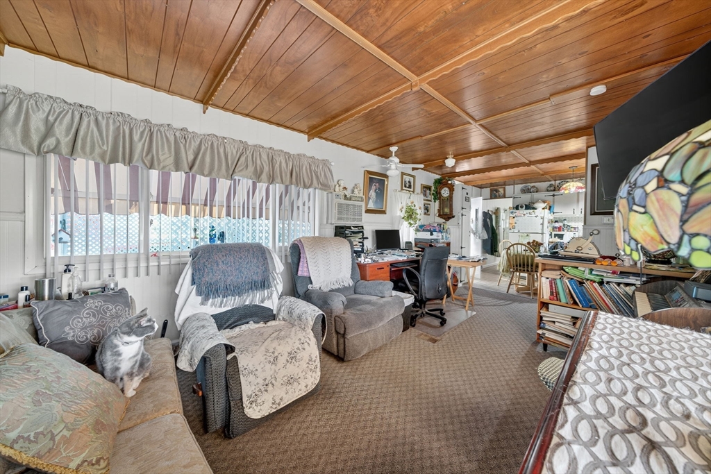 1 Clems Way Acushnet, MA 02743 - Photo 12 of 16 a living room with furniture and a large window