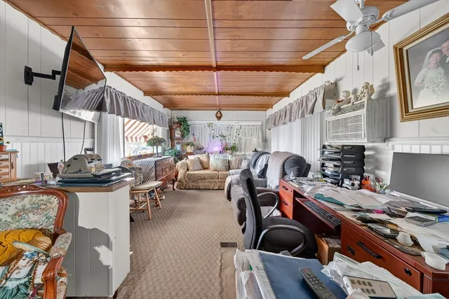 a bedroom with furniture and a bed