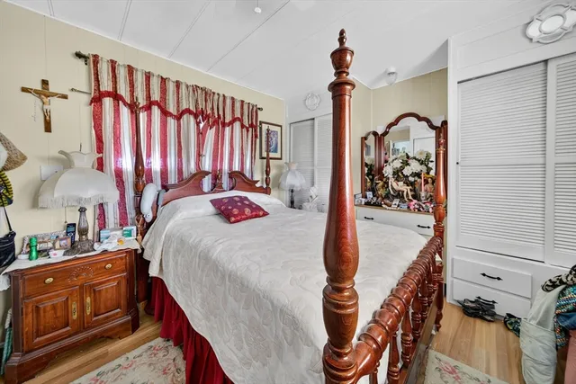 a bathroom with a sink vanity and a mirror