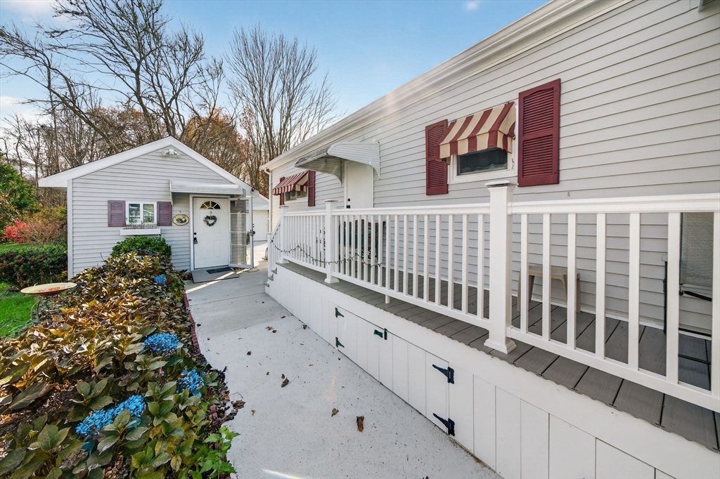 1 Clems Way Acushnet, MA 02743 - Photo 4 of 16 a view of a house with wooden fence