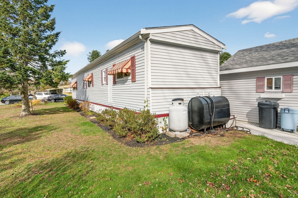 1 Clems Way Acushnet, MA 02743 - Photo 7 of 16 a view of a house with backyard