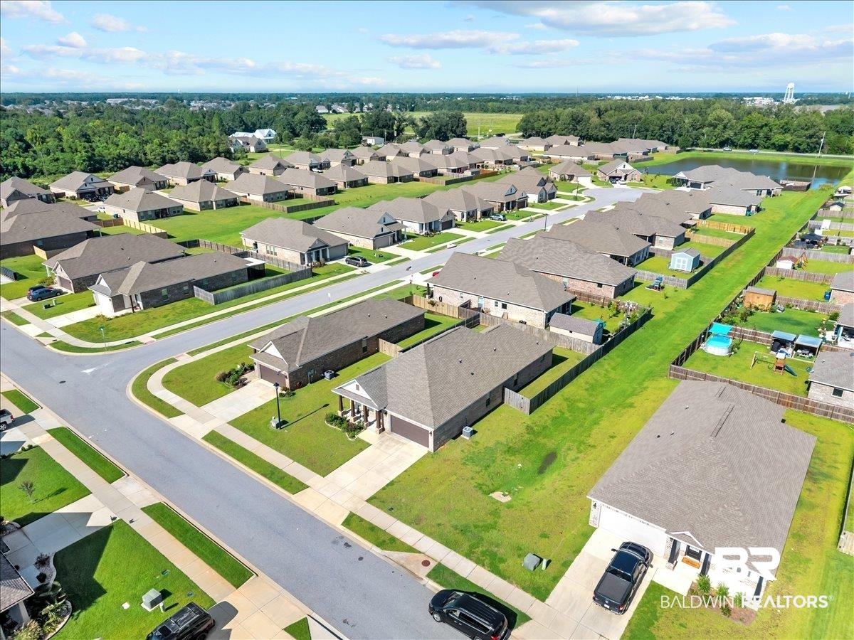 1112 Stella Road Foley, AL 36535 - Photo 27 of 33 Aerial perspective of suburban area