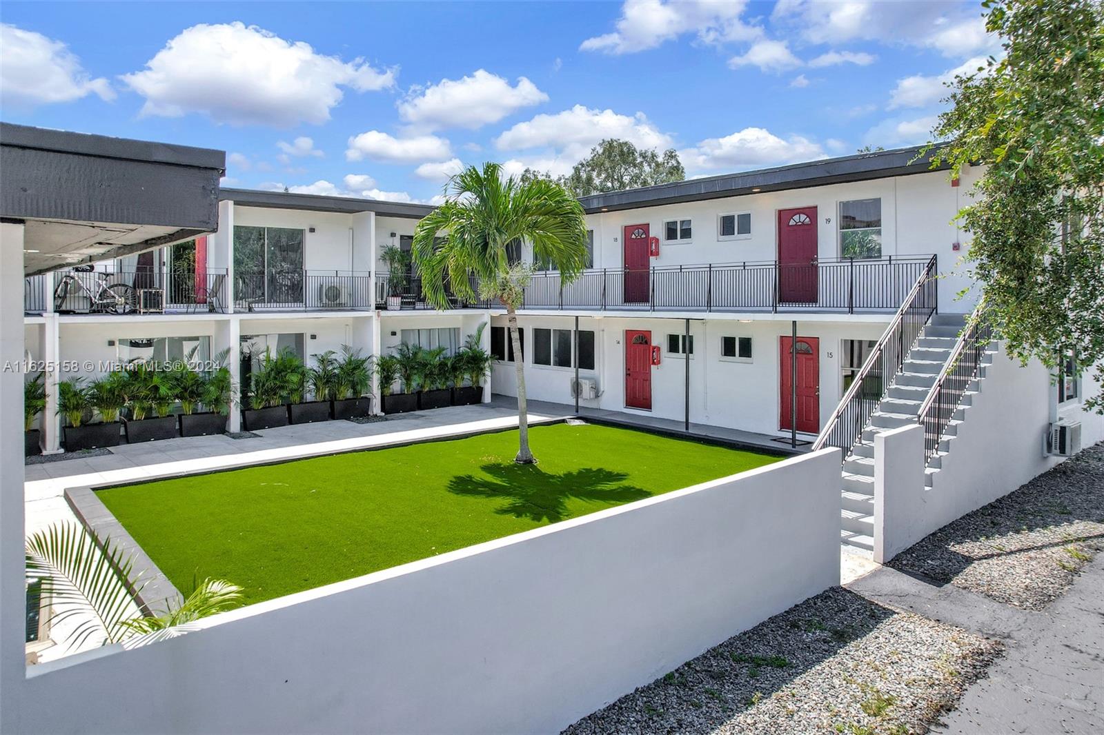 14280 Northeast 6th Avenue North Miami, FL 33161 - Photo 23 of 51 swimming pool view with a seating space and garden view