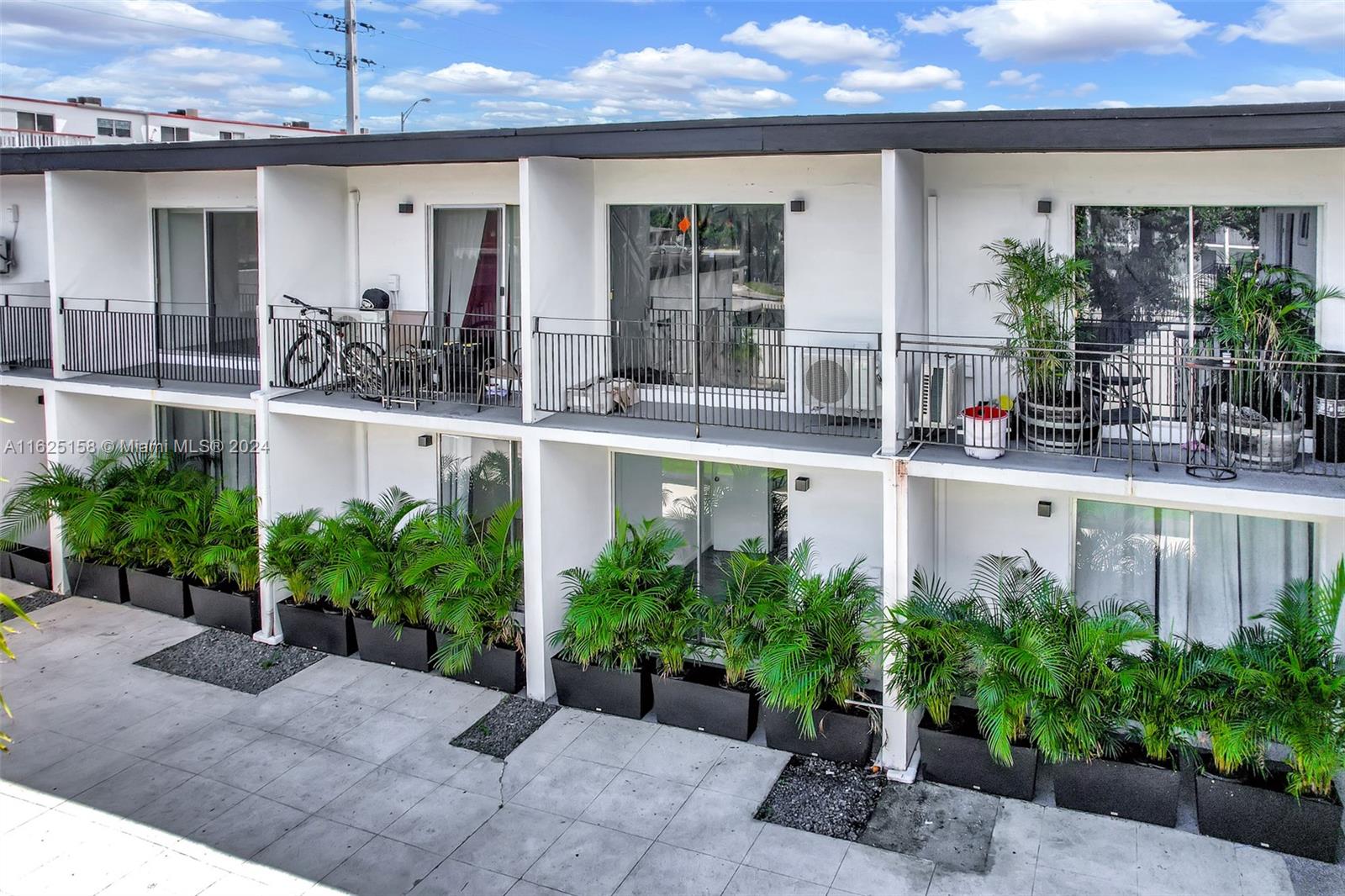 14280 Northeast 6th Avenue North Miami, FL 33161 - Photo 25 of 51 a front view of a house with plants