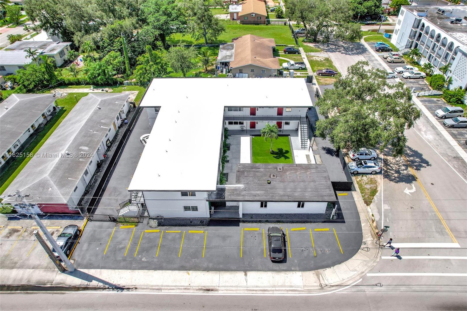 14280 Northeast 6th Avenue North Miami, FL 33161 - Photo 31 of 51 a view of building and front view of a house