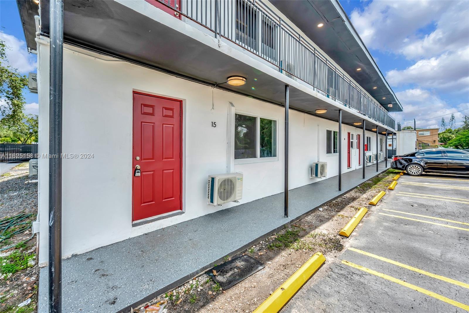 14280 Northeast 6th Avenue North Miami, FL 33161 - Photo 32 of 51 a view of a balcony with an outdoor seating