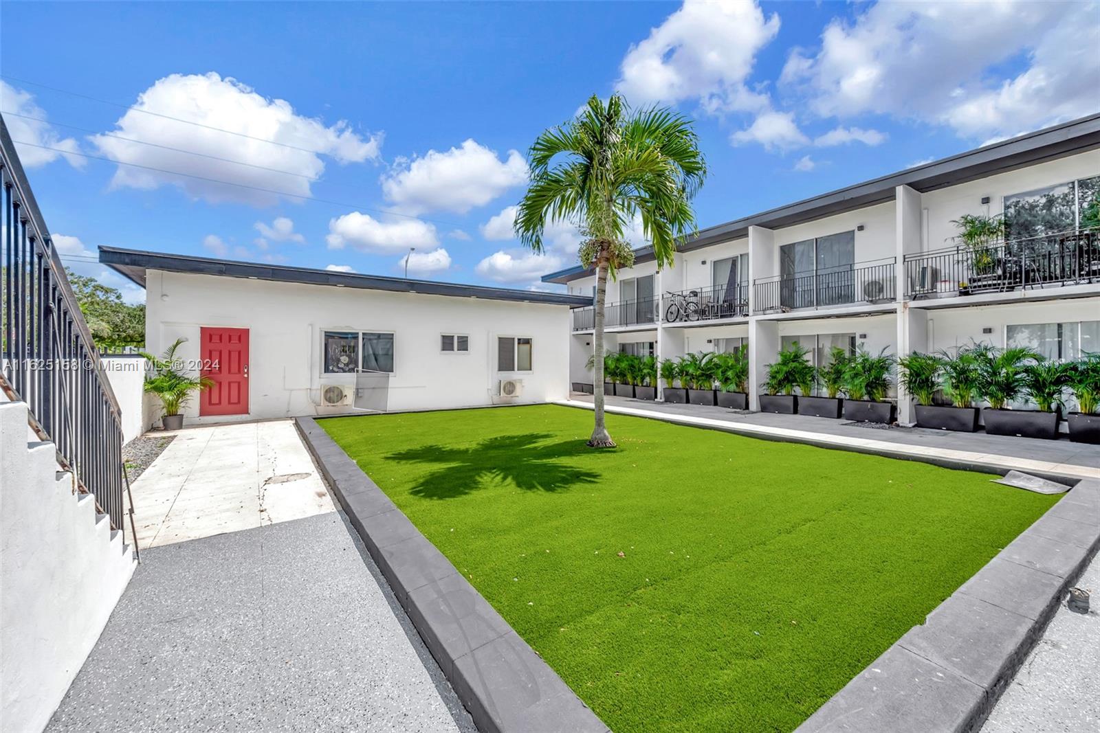 14280 Northeast 6th Avenue North Miami, FL 33161 - Photo 38 of 51 a view of house with swimming pool outdoor seating