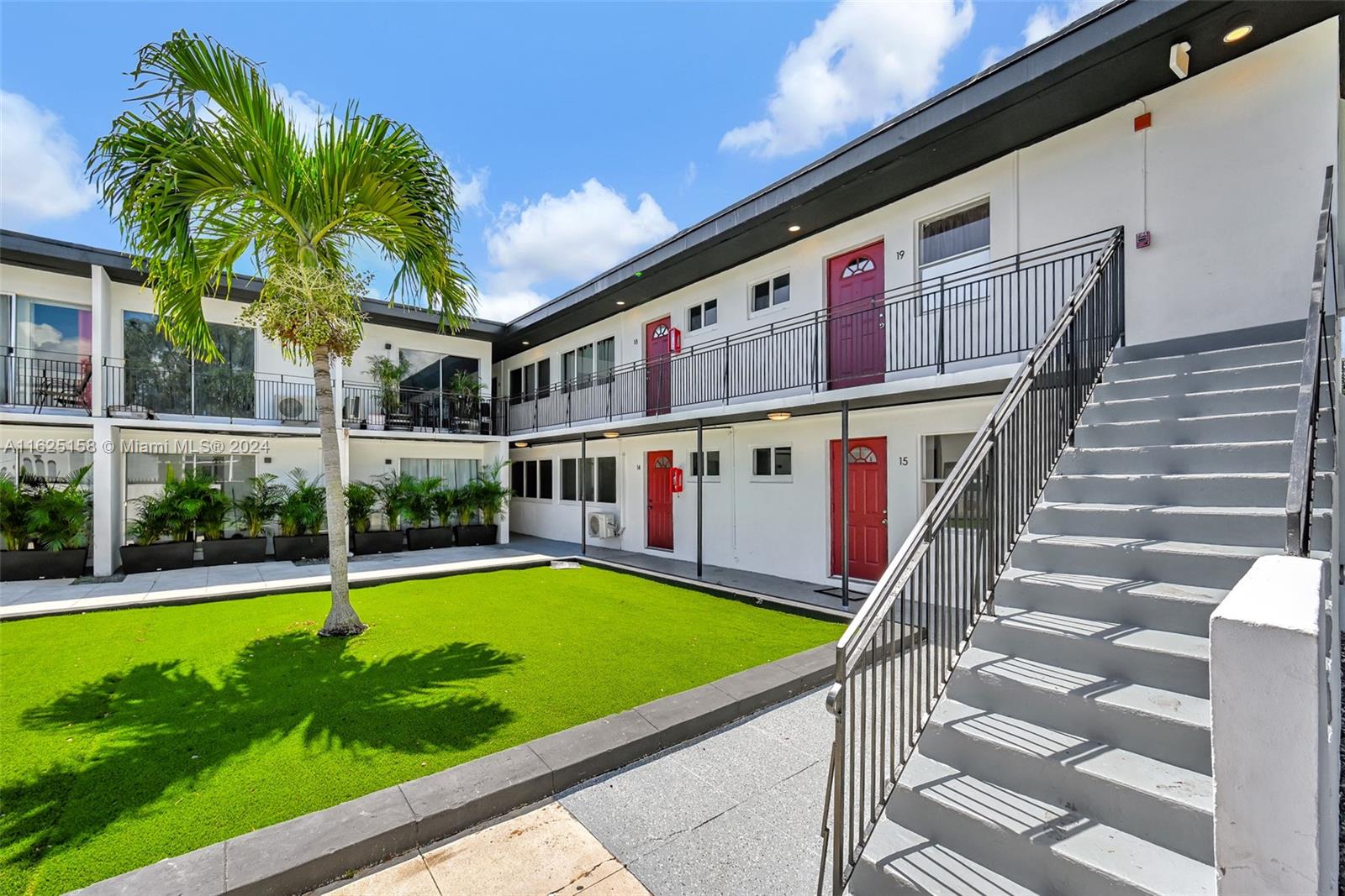 14280 Northeast 6th Avenue North Miami, FL 33161 - Photo 4 of 51 a view of swimming pool with lawn chairs and plants