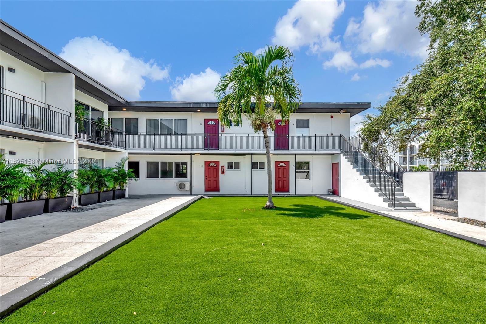 14280 Northeast 6th Avenue North Miami, FL 33161 - Photo 42 of 51 a view of house with a big yard and potted plants