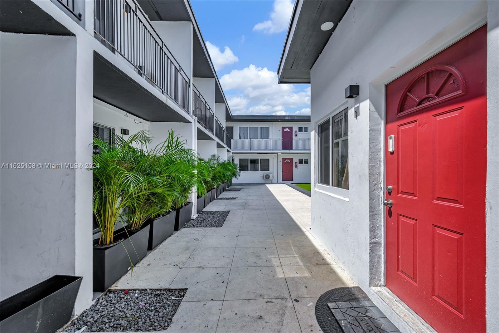 14280 Northeast 6th Avenue North Miami, FL 33161 - Photo 44 of 51 a view of a house with a street