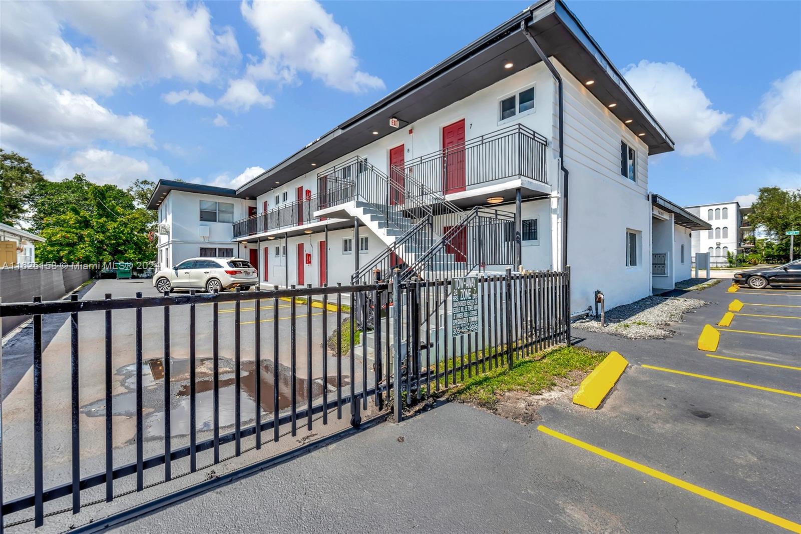 14280 Northeast 6th Avenue North Miami, FL 33161 - Photo 45 of 51 a view of a house with a balcony