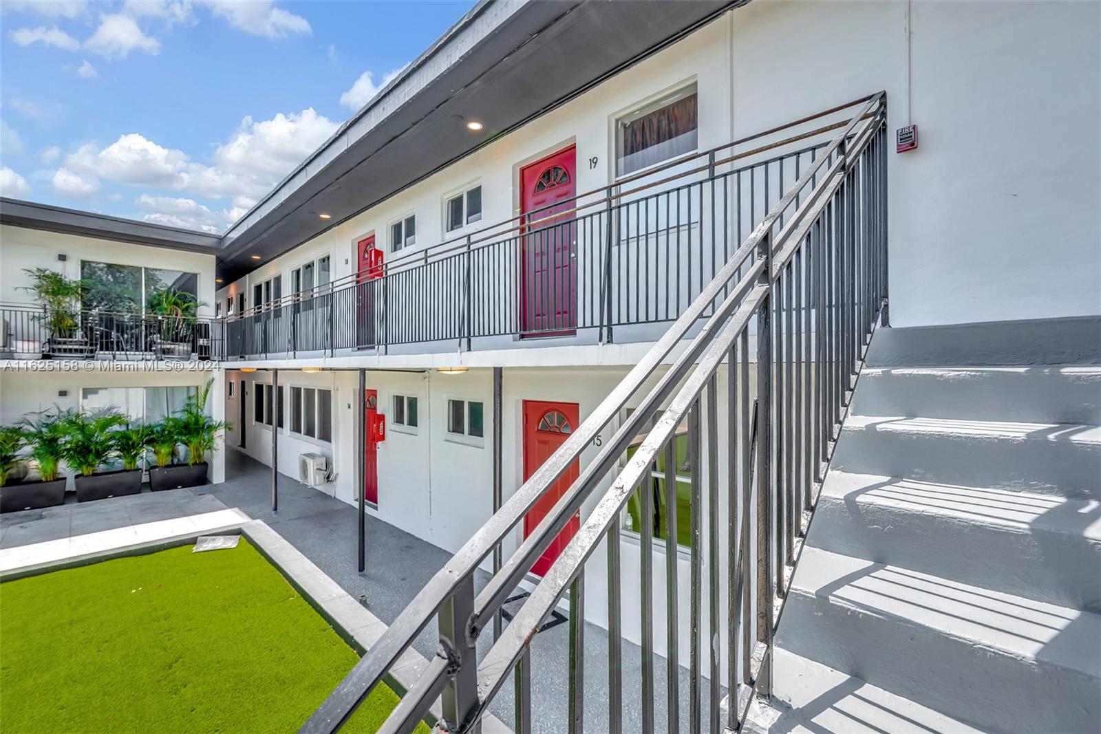 14280 Northeast 6th Avenue North Miami, FL 33161 - Photo 47 of 51 a view of an entryway with an front of yellow house