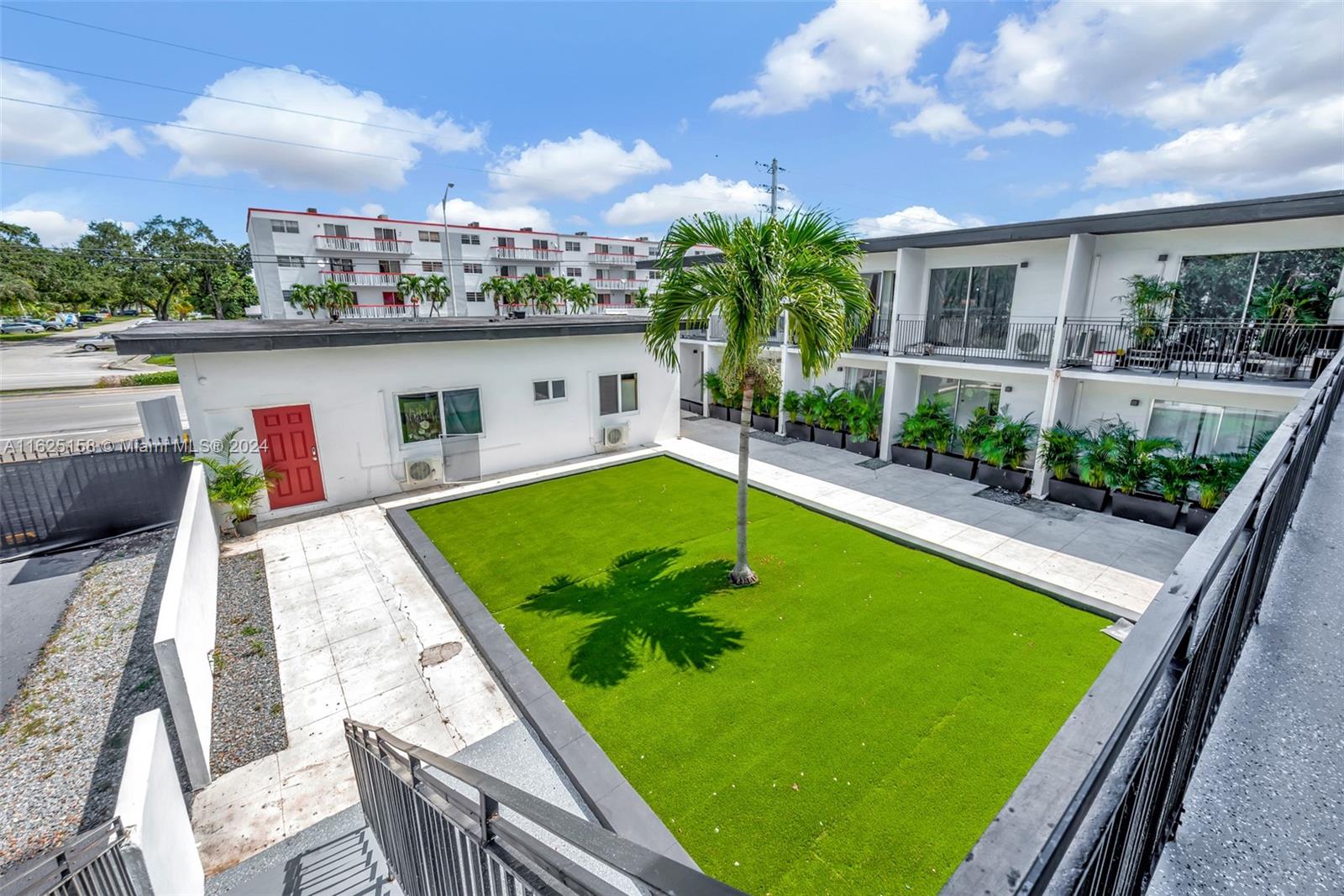 14280 Northeast 6th Avenue North Miami, FL 33161 - Photo 48 of 51 a view of a balcony with a patio