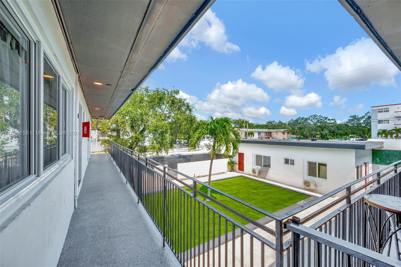14280 Northeast 6th Avenue North Miami, FL 33161 - Photo 51 of 51 a balcony view with a garden space