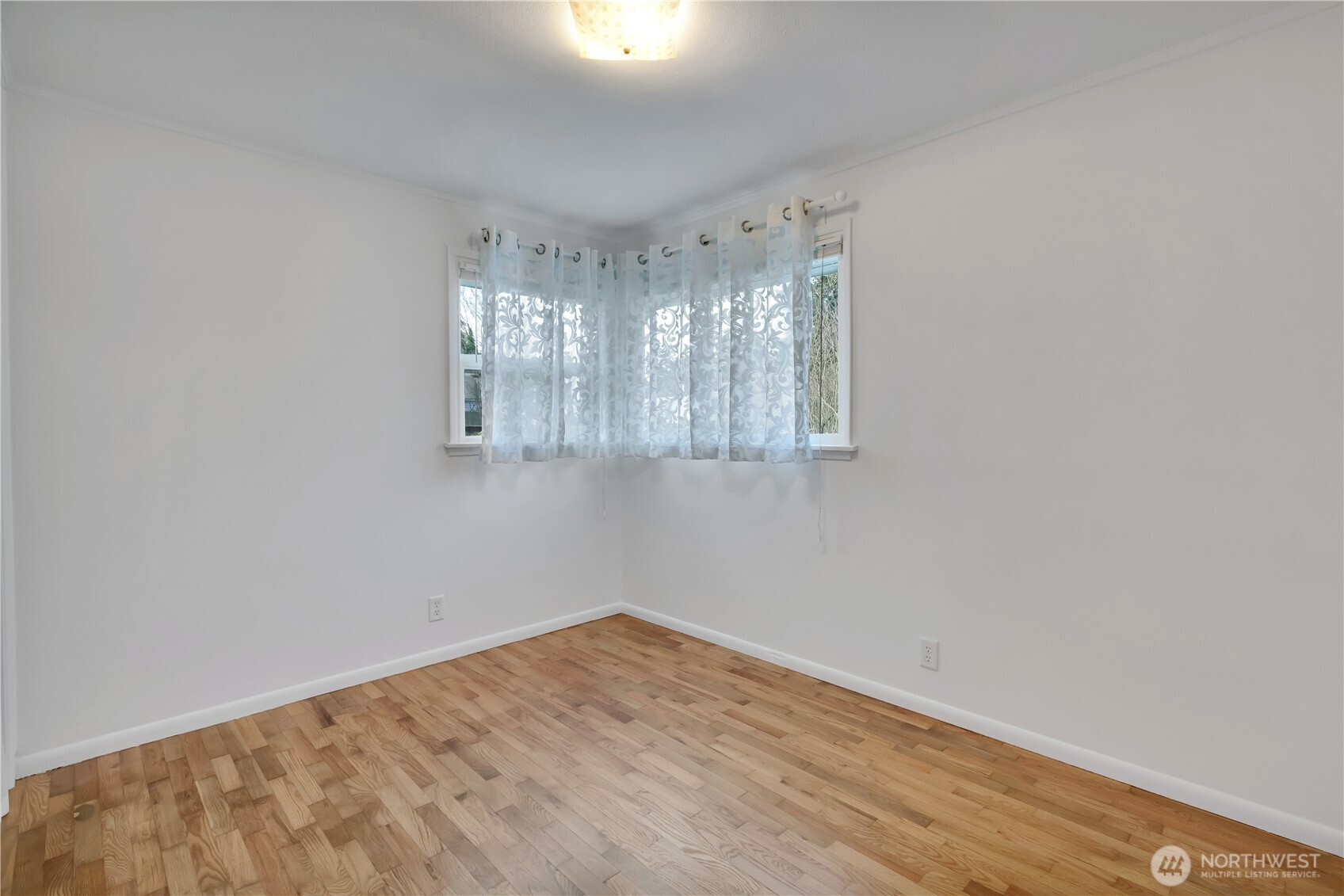 10421 2nd Place Southwest Seattle, WA 98146 - Photo 19 of 28 a view of empty room with window