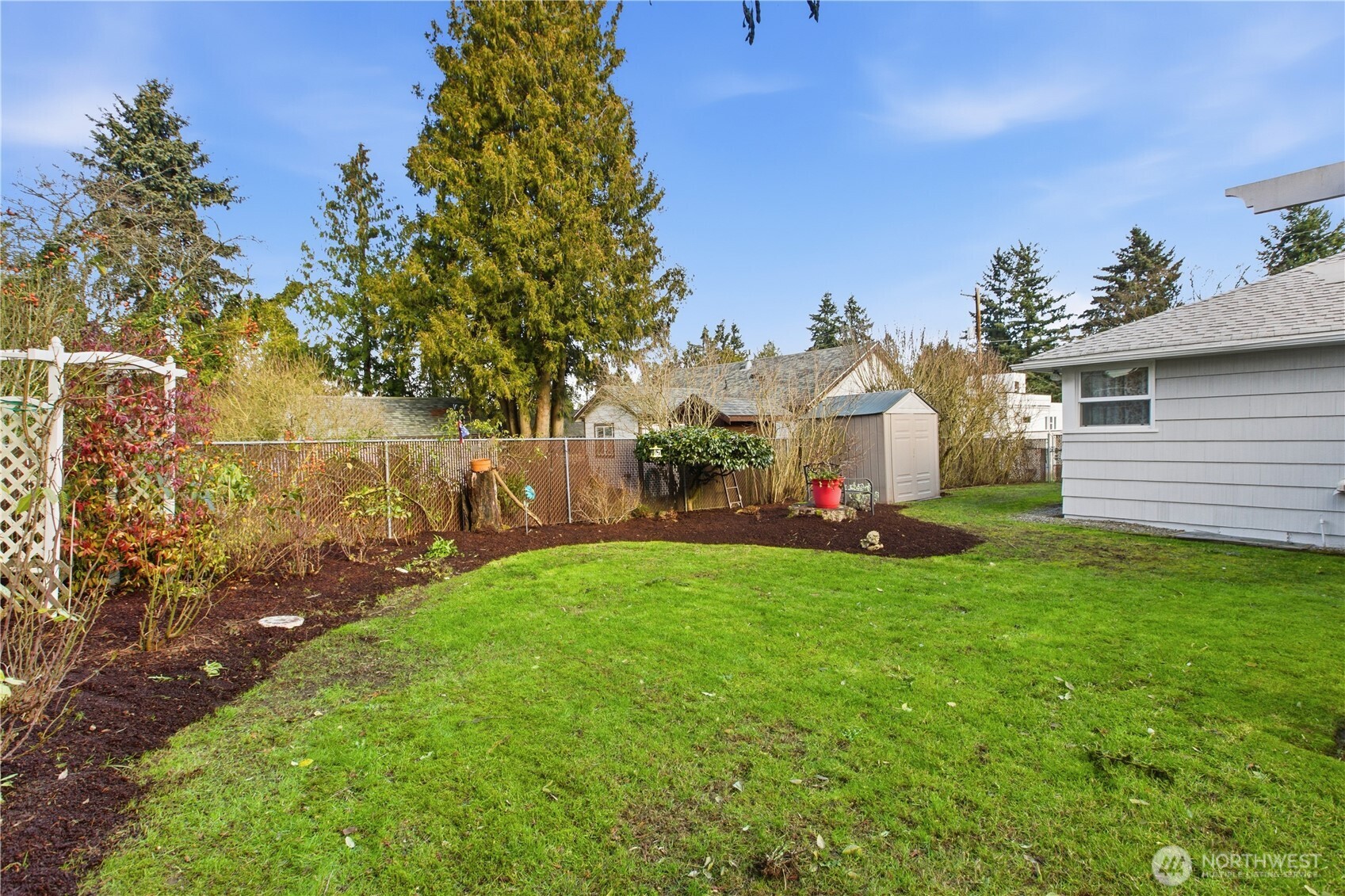 10421 2nd Place Southwest Seattle, WA 98146 - Photo 26 of 28 a view of a house with backyard porch and garden