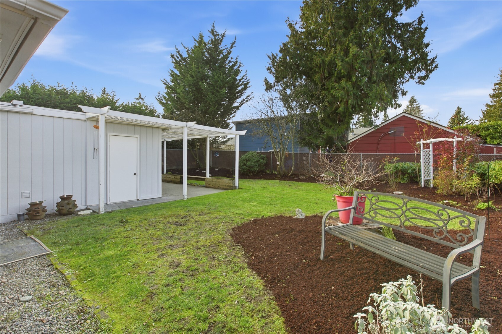 10421 2nd Place Southwest Seattle, WA 98146 - Photo 27 of 28 a view of a house with backyard and sitting area