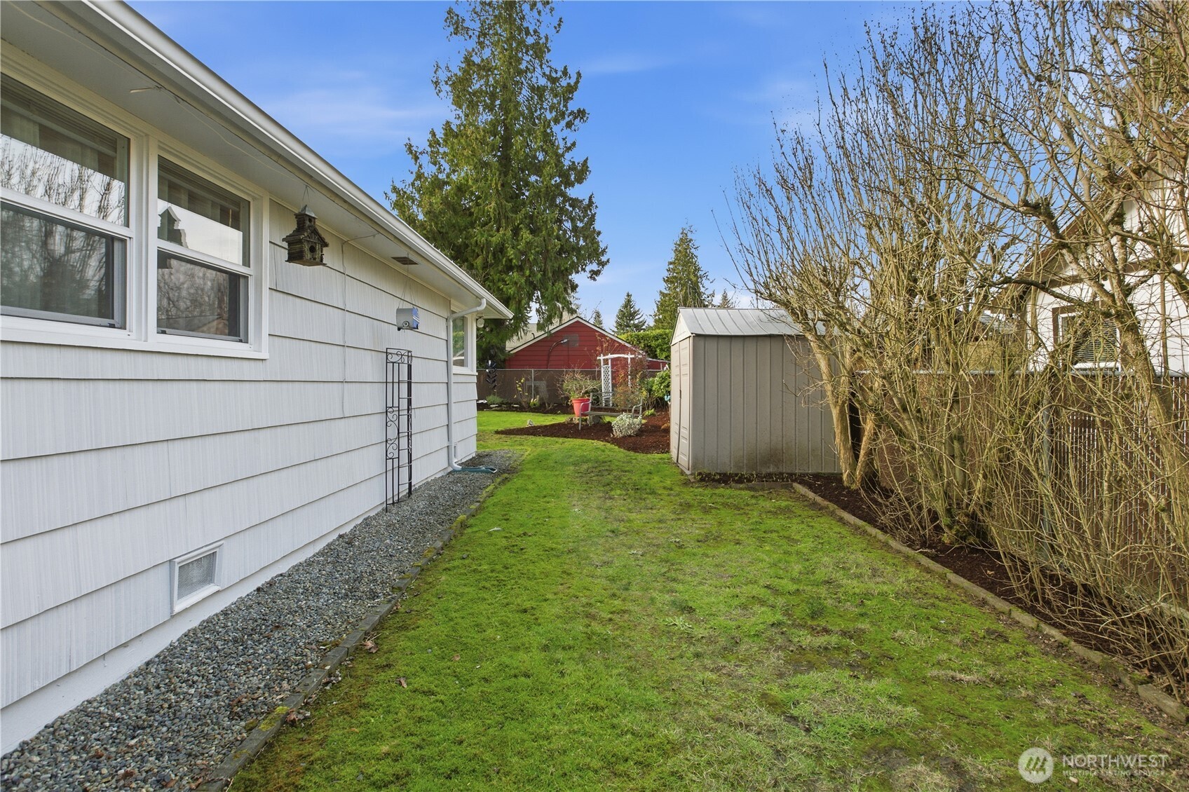 10421 2nd Place Southwest Seattle, WA 98146 - Photo 28 of 28 a view of a backyard with a garden