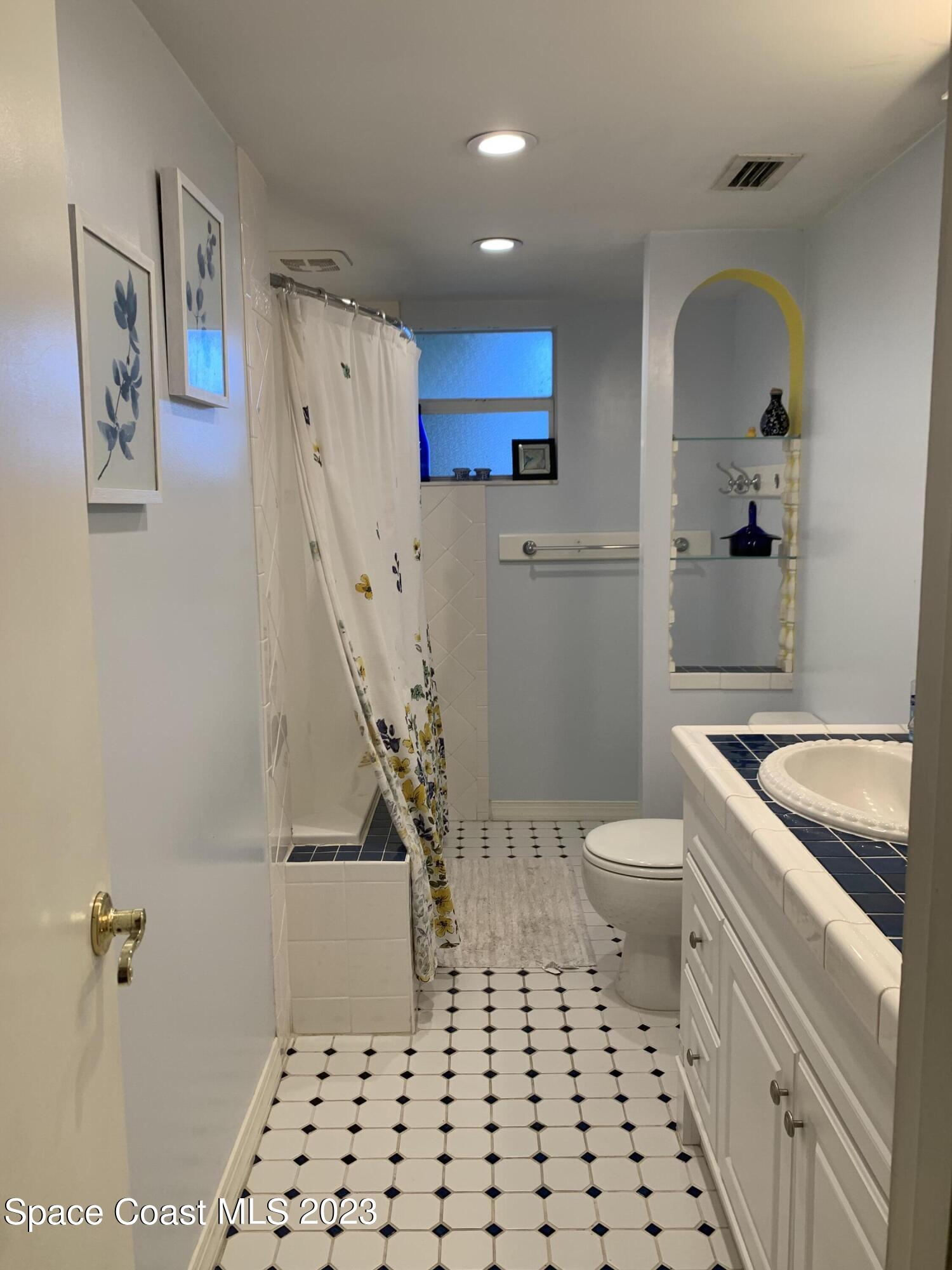 1771 Britt Road Cocoa, FL 32926 - Photo 17 of 48 20-Hall Bathroom