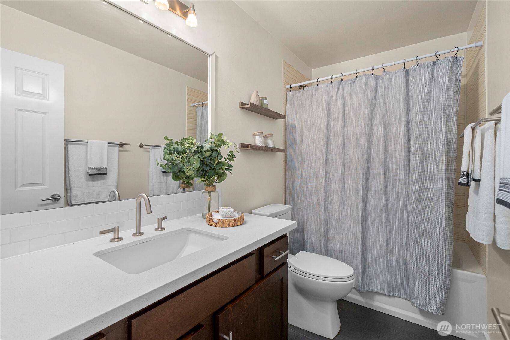 13827 Macadam Road South Tukwila, WA 98168 - Photo 17 of 29 a bathroom with a sink a toilet and shower curtain