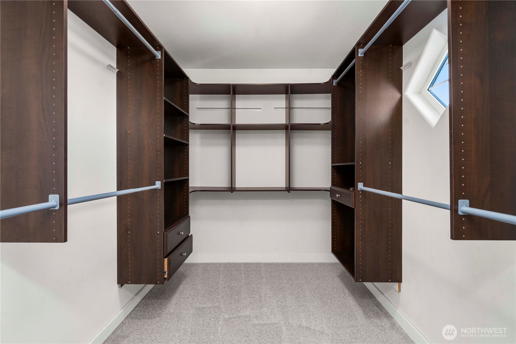 13827 Macadam Road South Tukwila, WA 98168 - Photo 19 of 29 a view of walk in closet with empty racks