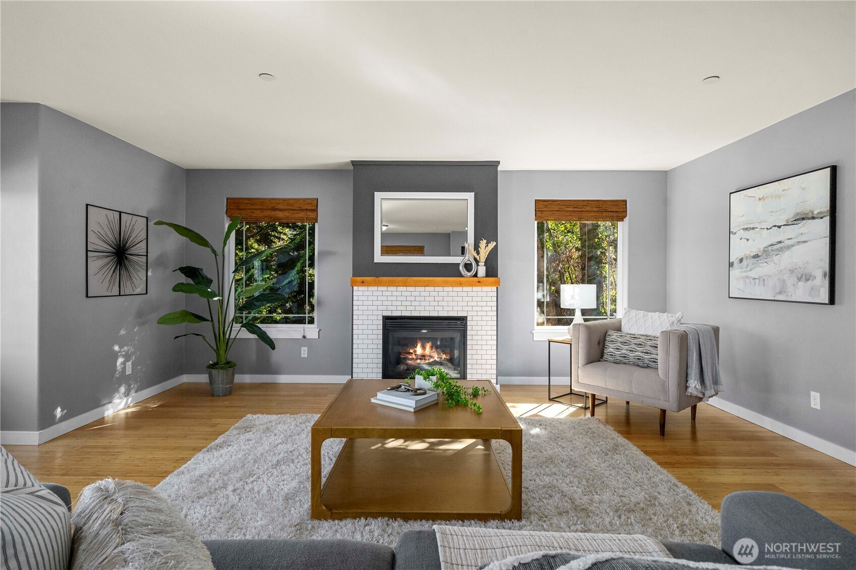 13827 Macadam Road South Tukwila, WA 98168 - Photo 4 of 29 a living room with furniture and a fireplace