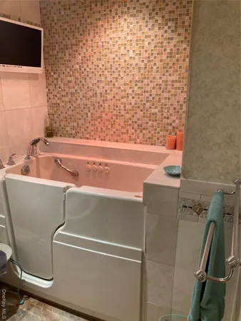 a bathroom with a bathtub