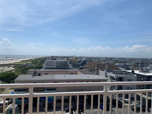 a view of a city with tall buildings in the background